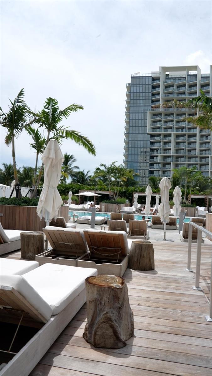 2301 Collins Avenue, Unit 836 Miami Beach, FL 33139 - Photo 21 of 29 a view of roof deck with couches and potted plants