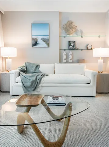 a living room with furniture and a couch