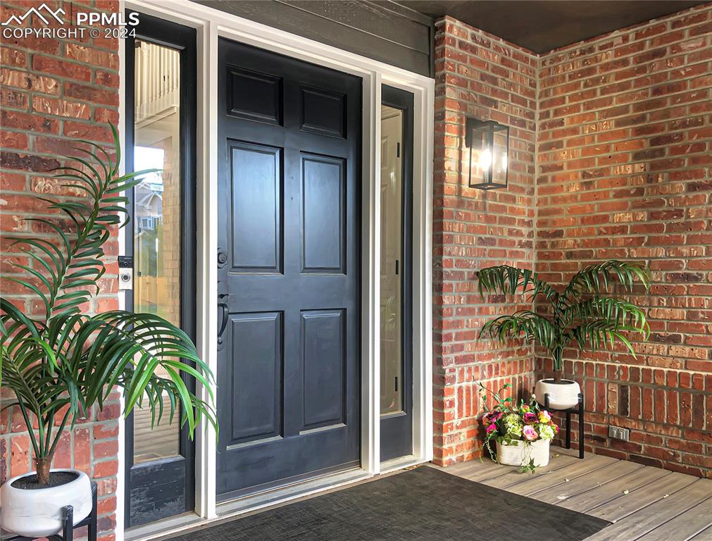 7873 Sweet Water Road Lone Tree, CO 80124 - Photo 2 of 48 a view of balcony with potted plants
