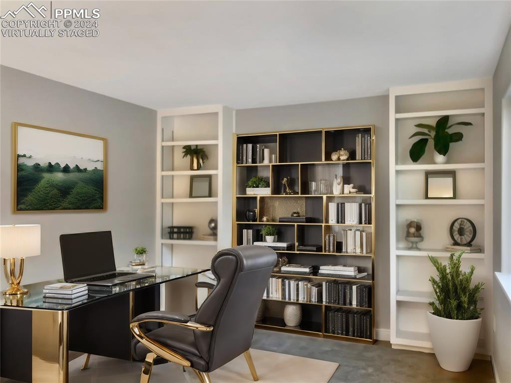 7873 Sweet Water Road Lone Tree, CO 80124 - Photo 22 of 48 a view of a workspace with a bookshelf