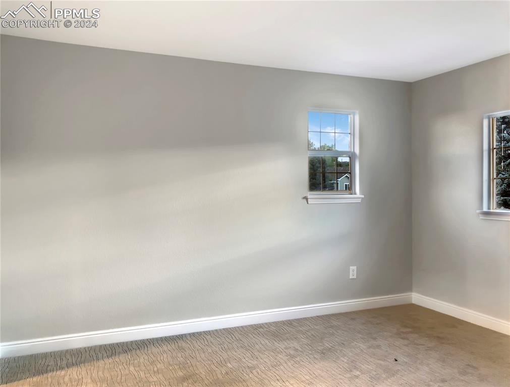 7873 Sweet Water Road Lone Tree, CO 80124 - Photo 25 of 48 an empty room with a window