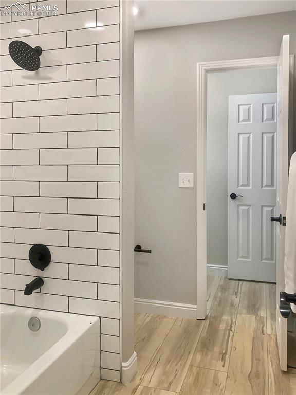 7873 Sweet Water Road Lone Tree, CO 80124 - Photo 27 of 48 a bathroom with a bathtub
