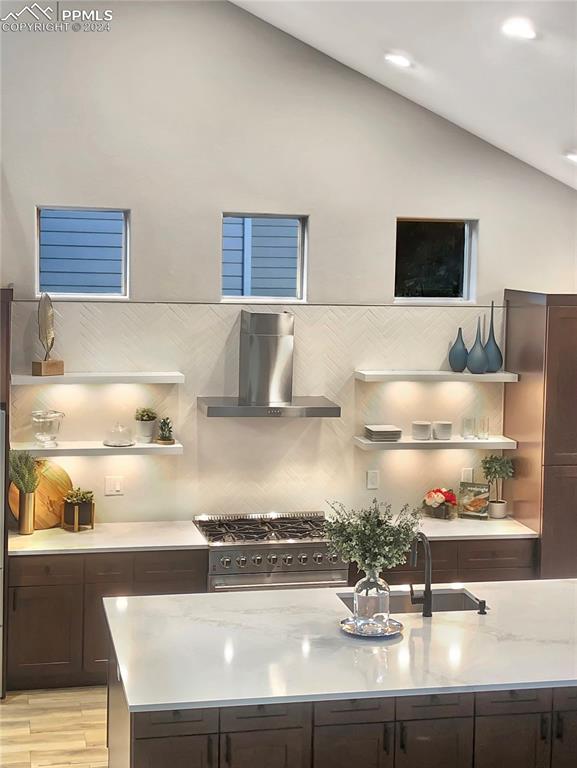 7873 Sweet Water Road Lone Tree, CO 80124 - Photo 8 of 48 a kitchen with kitchen island sink stove and cabinets