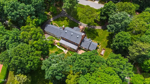 a kitchen with stainless steel appliances granite countertop a sink a stove and refrigerator