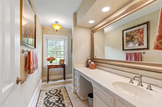 a bathroom with a bathtub and window