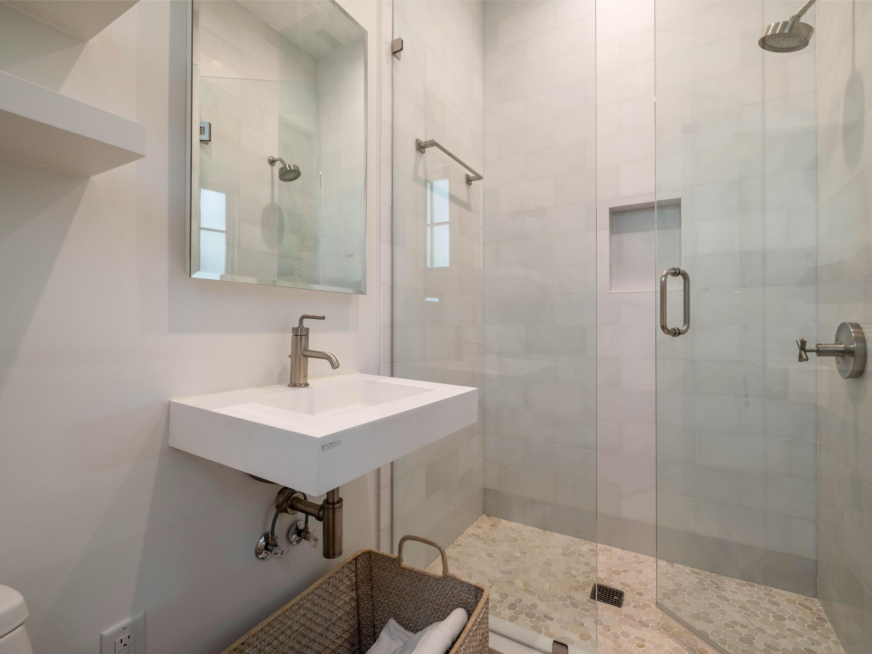 191 Sand Oaks Circle Santa Rosa Beach, FL 32459 - Photo 14 of 47 a bathroom with a sink toilet and shower
