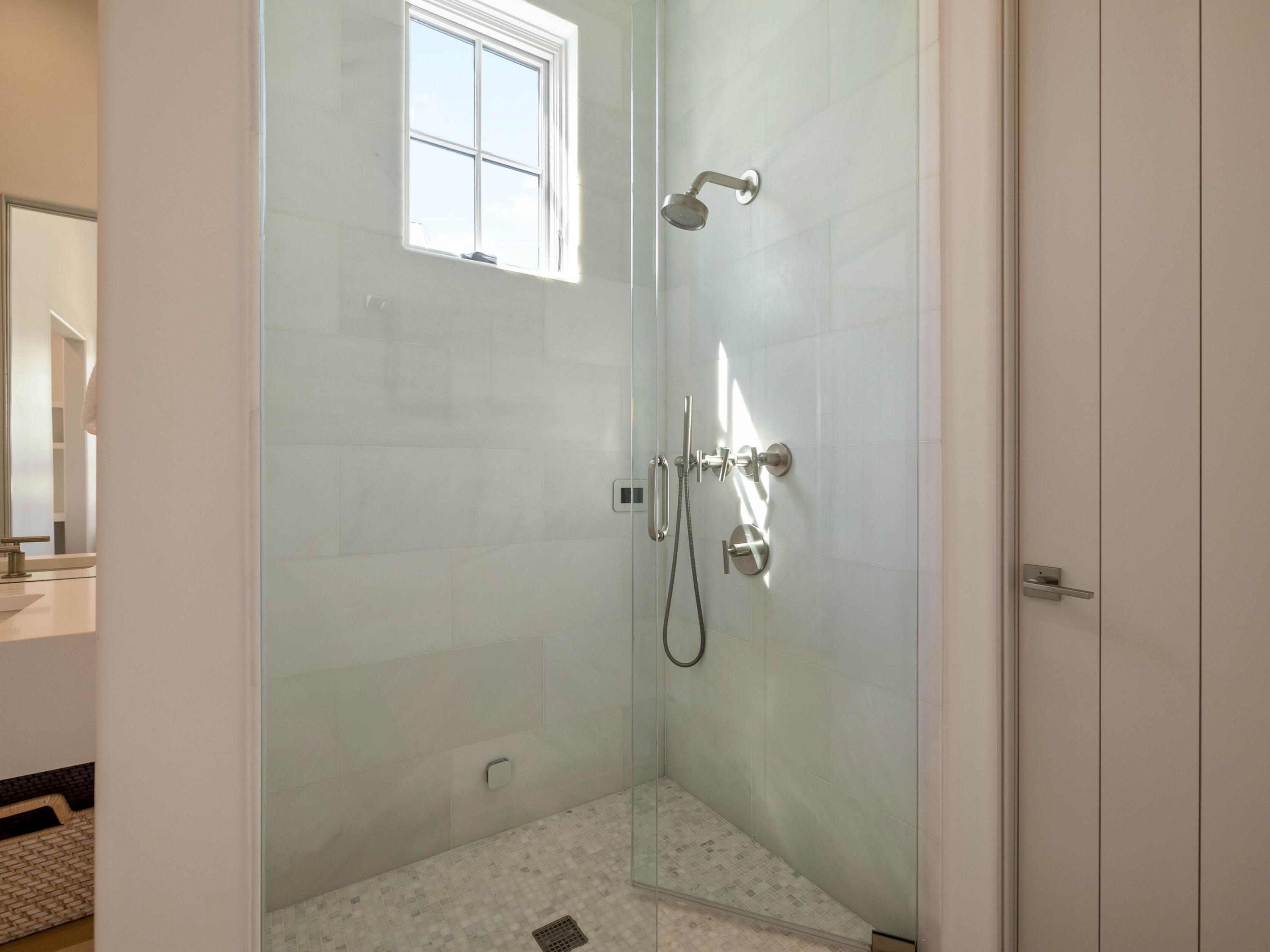 191 Sand Oaks Circle Santa Rosa Beach, FL 32459 - Photo 39 of 47 a bathroom with a shower
