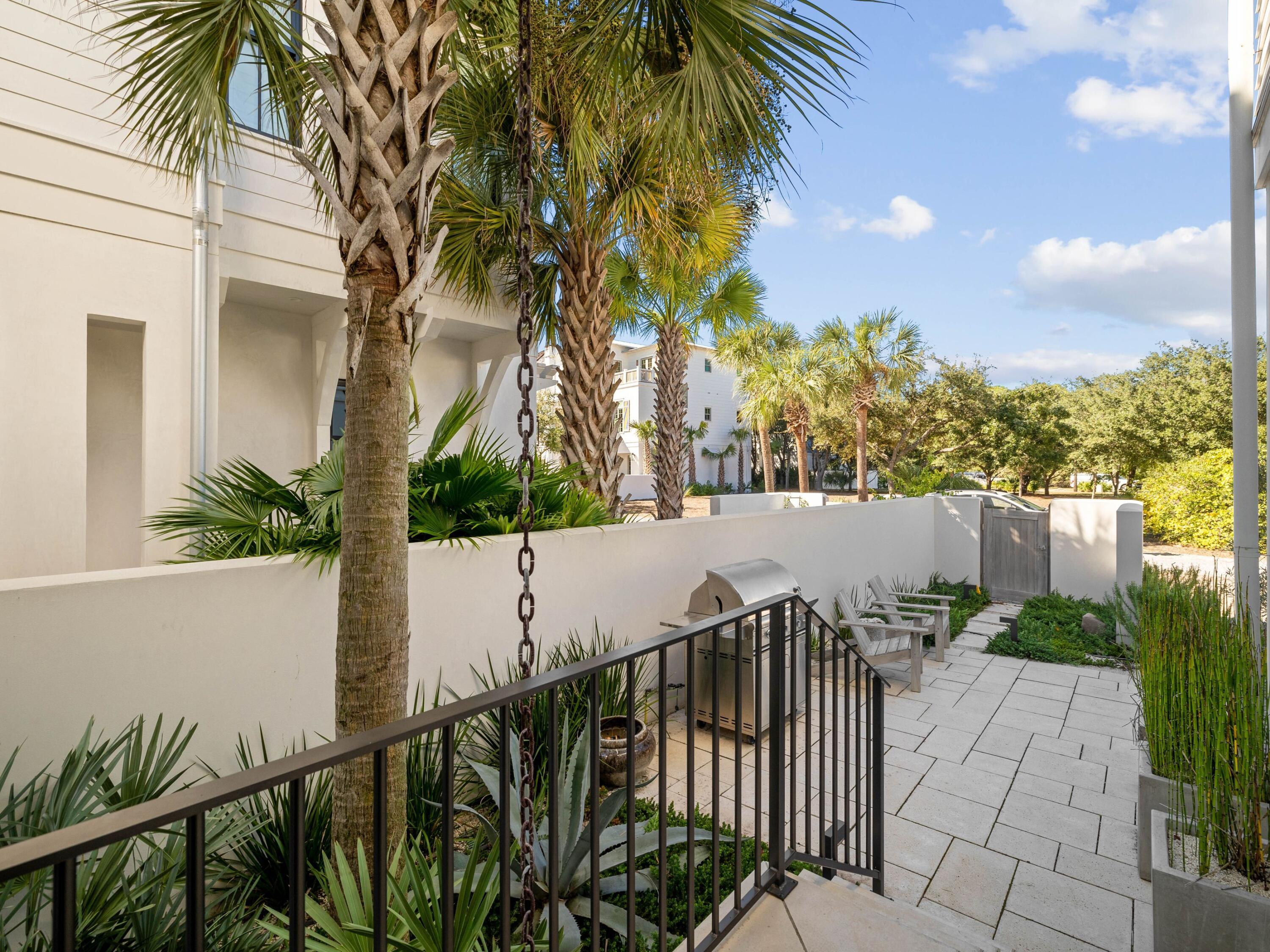 191 Sand Oaks Circle Santa Rosa Beach, FL 32459 - Photo 7 of 47 a view of balcony with wooden floor and fence
