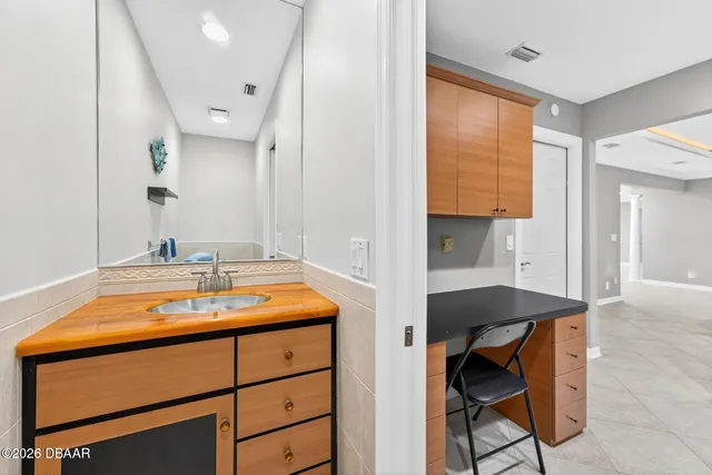 a view of a park with large trees