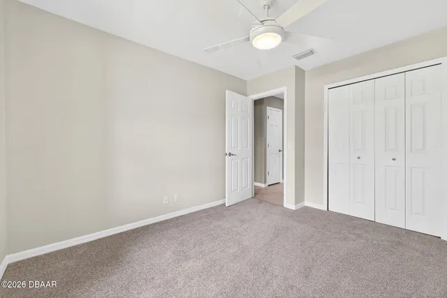 a view of a playground with basketball court