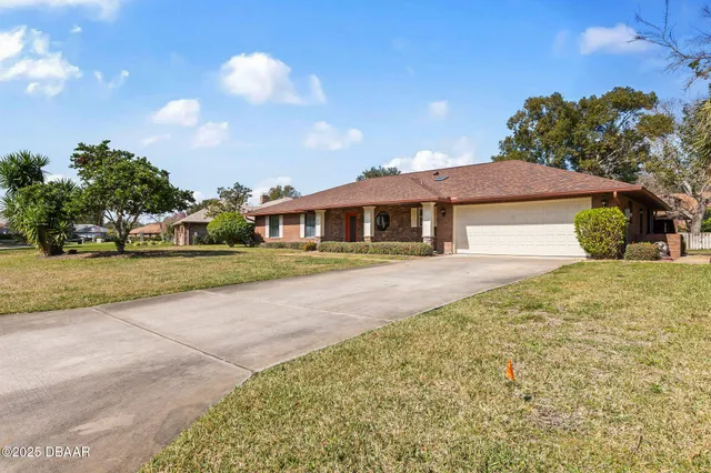 a view of swimming pool with an outdoor space and seating area