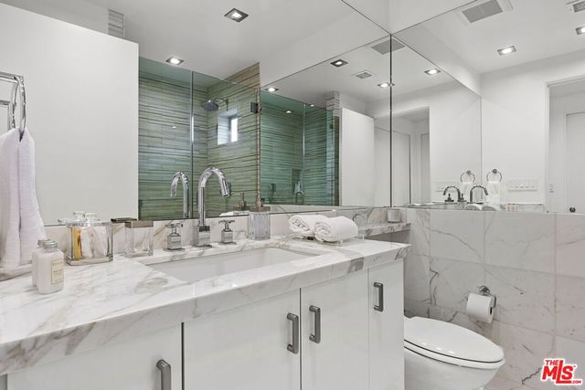 a view of balcony with furniture