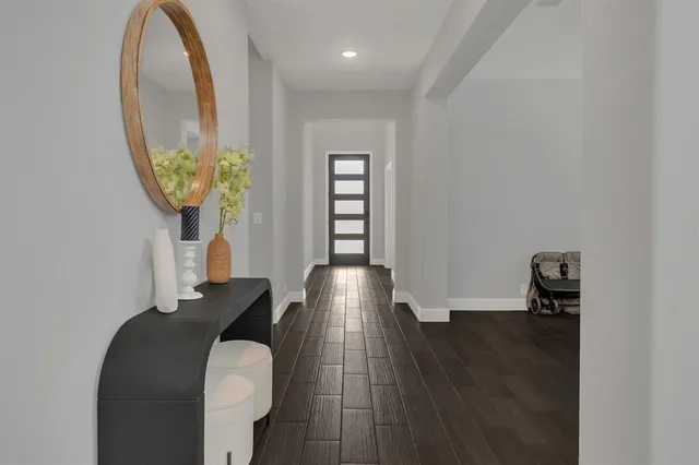 a view of livingroom with furniture and wooden floor