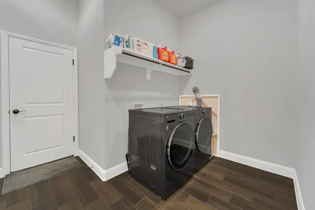 a utility room with dryer and washer