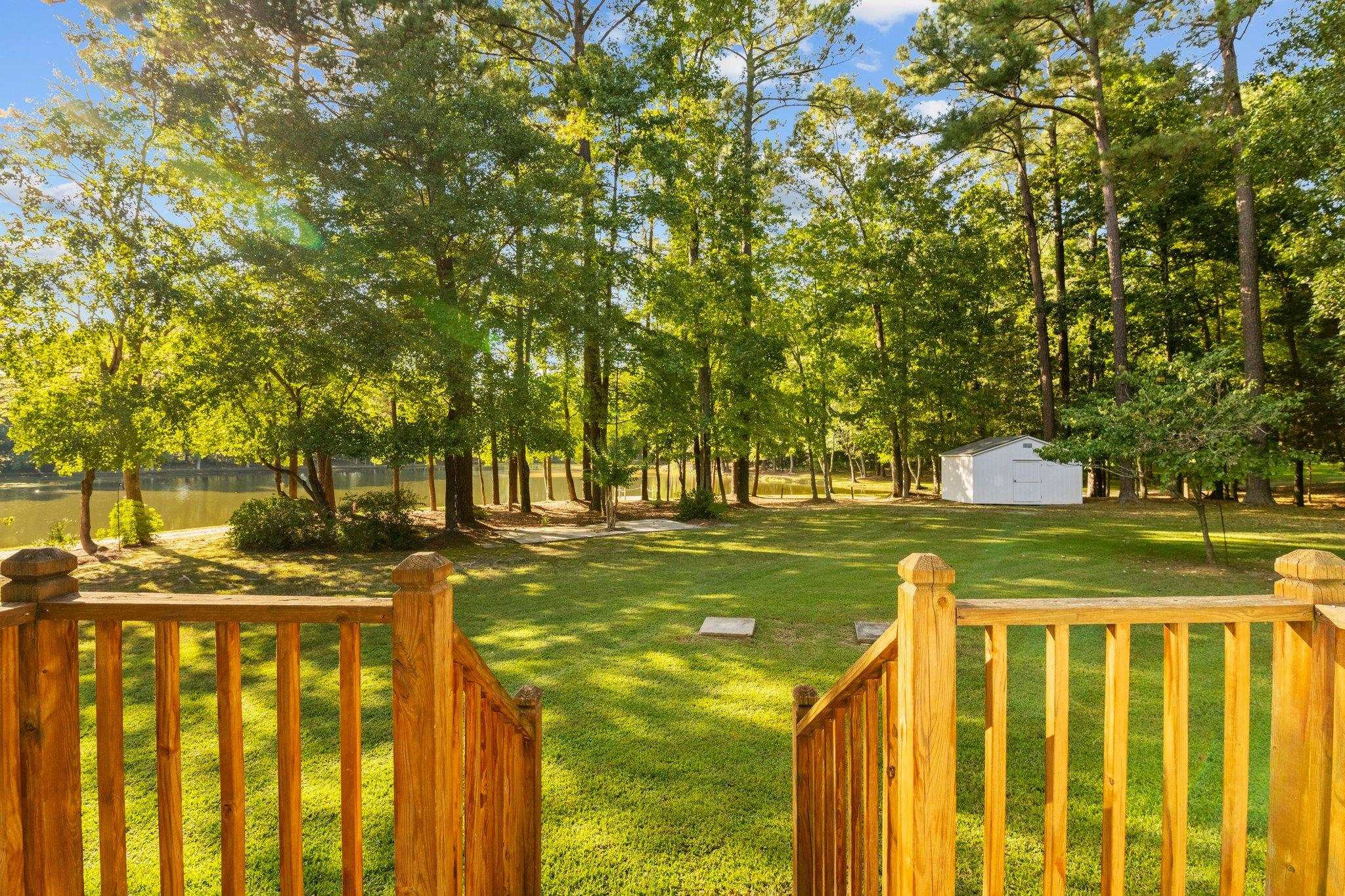 8025 Lockleair Road Zebulon, NC 27597 - Photo 13 of 30 Keep eyes on whatever is happening in back yard from kitchen, living area, or master suite. Back Door View