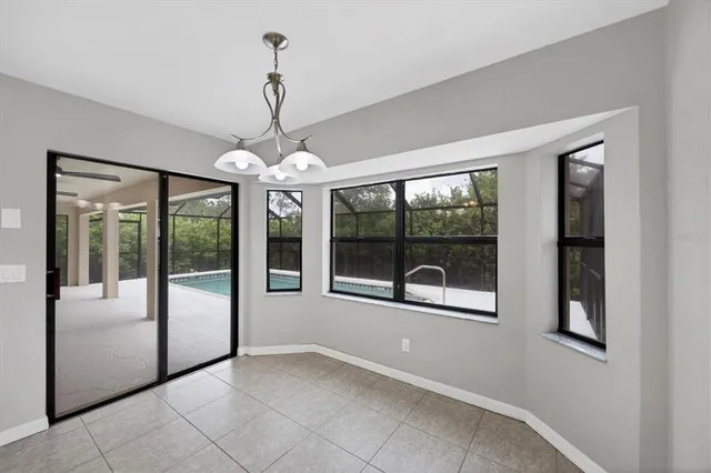 a bathroom with a tub and sink