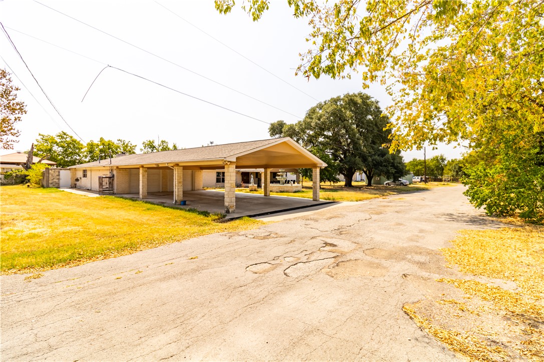 1214 Bittle Lane Bryan, TX 77801 - Photo 1 of 41 a view of residential houses with yard and swimming pool
