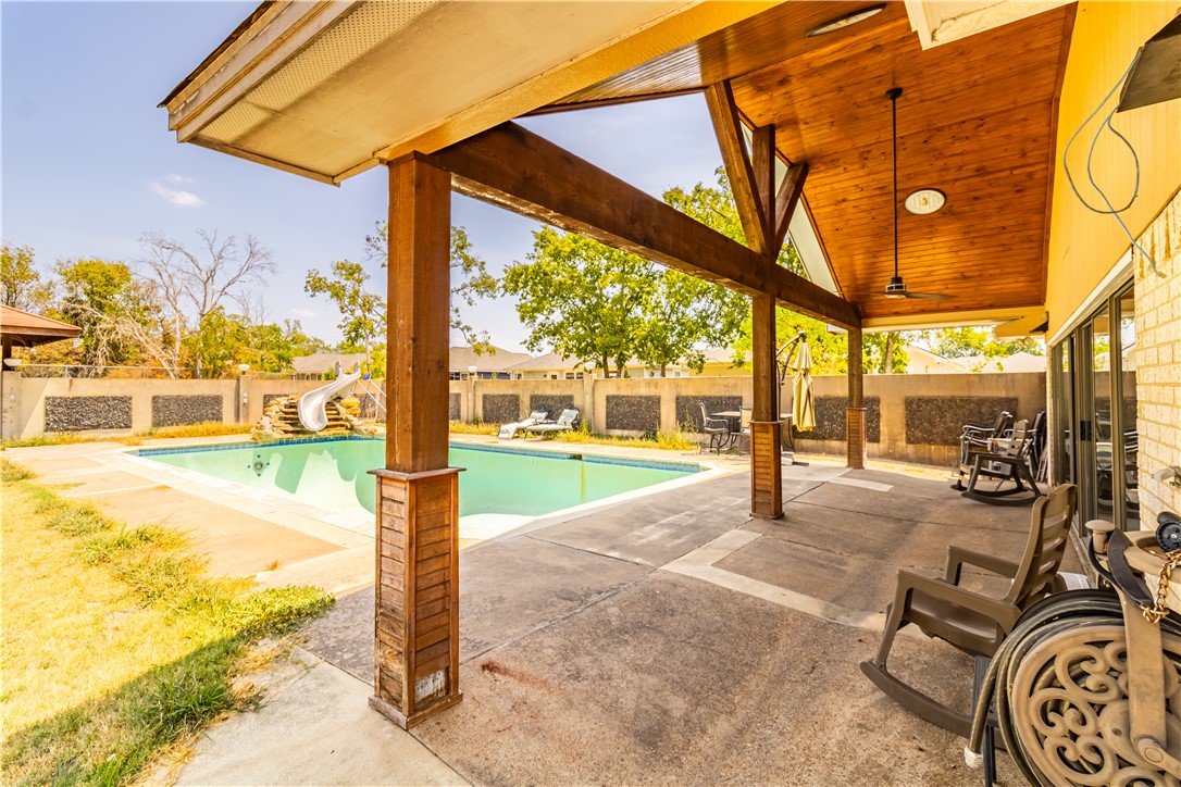 1214 Bittle Lane Bryan, TX 77801 - Photo 24 of 41 a view of a swimming pool with a patio