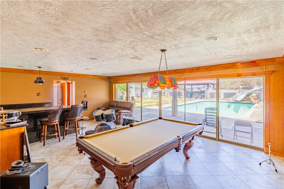 1214 Bittle Lane Bryan, TX 77801 - Photo 27 of 41 a room with furniture pool table and windows