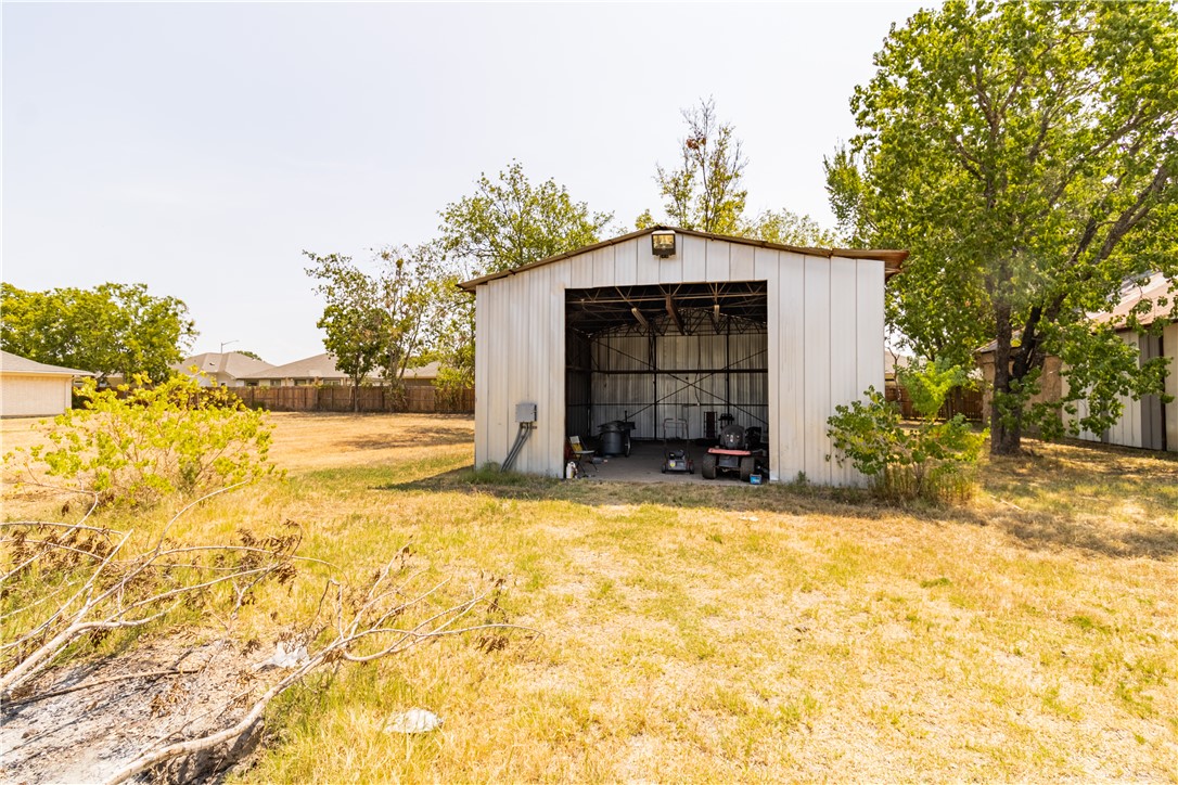 1214 Bittle Lane Bryan, TX 77801 - Photo 35 of 41 a view of a house with a yard