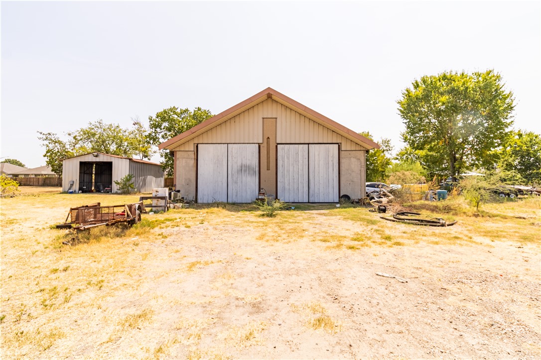 1214 Bittle Lane Bryan, TX 77801 - Photo 36 of 41 a view of a house with a yard