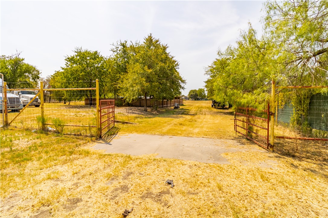 1214 Bittle Lane Bryan, TX 77801 - Photo 37 of 41 a view of a swimming pool with an outdoor space