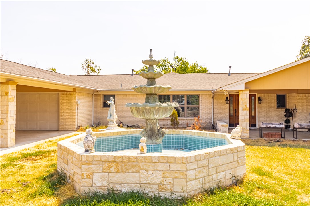 1214 Bittle Lane Bryan, TX 77801 - Photo 4 of 41 a view of house with swimming pool outdoor seating and yard