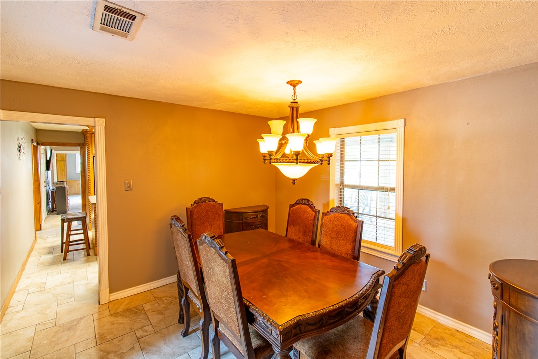 1214 Bittle Lane Bryan, TX 77801 - Photo 7 of 41 a dining room with furniture and window