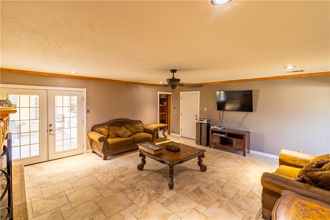 1214 Bittle Lane Bryan, TX 77801 - Photo 10 of 41 a living room with furniture and a flat screen tv