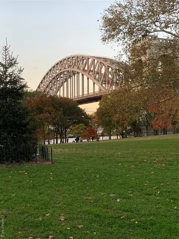 a view of an house with a big yard