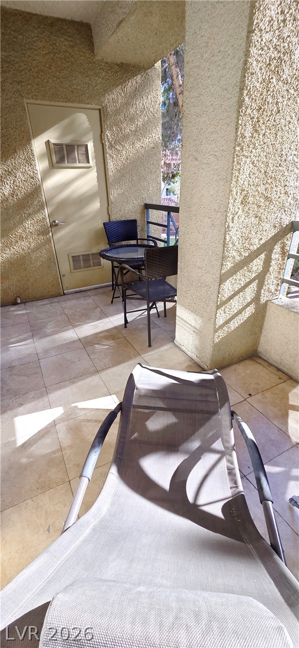 210 East Flamingo Road, Unit 208 Las Vegas, NV 89169 - Photo 28 of 42 An inviting outdoor space offers a private retreat for relaxation.