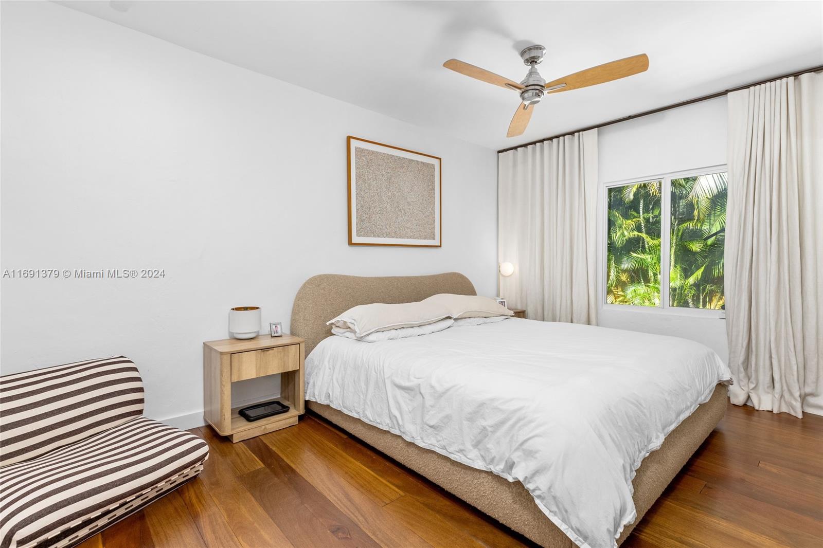 3685 St Gaudens Road Miami, FL 33133 - Photo 25 of 66 a bedroom with a bed and a window