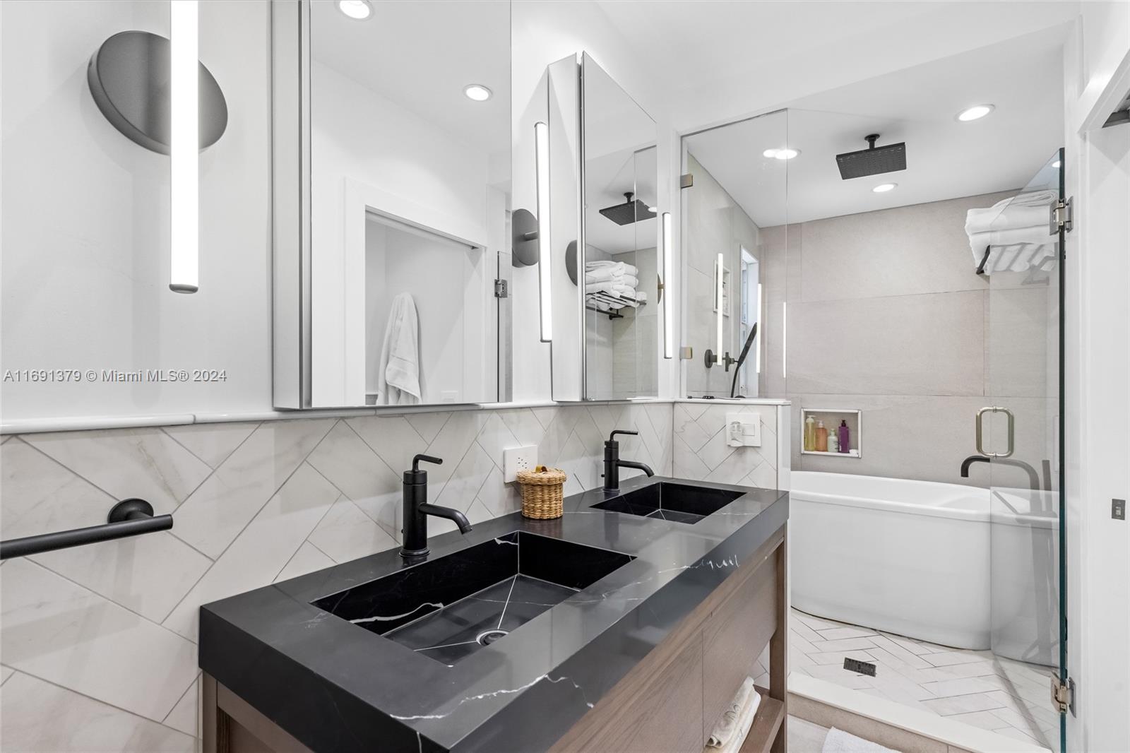 3685 St Gaudens Road Miami, FL 33133 - Photo 30 of 66 a kitchen with a sink a stove a refrigerator and white cabinets with wooden floor