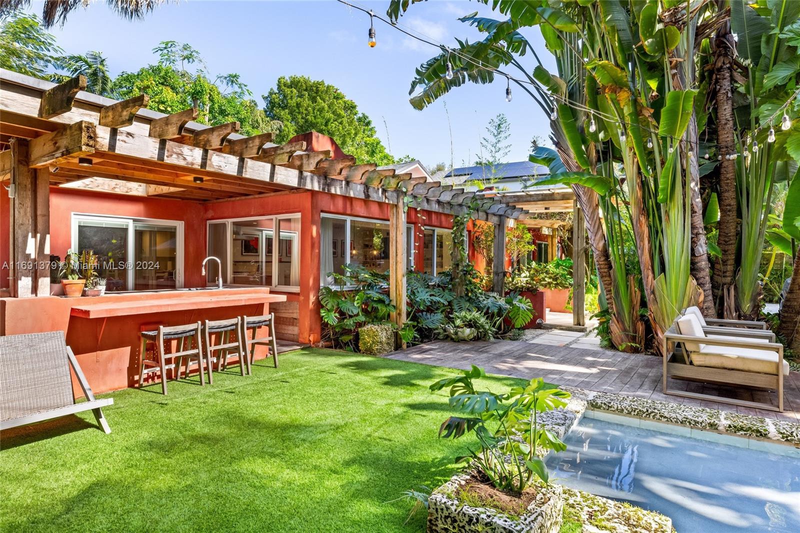 3685 St Gaudens Road Miami, FL 33133 - Photo 44 of 66 front view of house with a yard