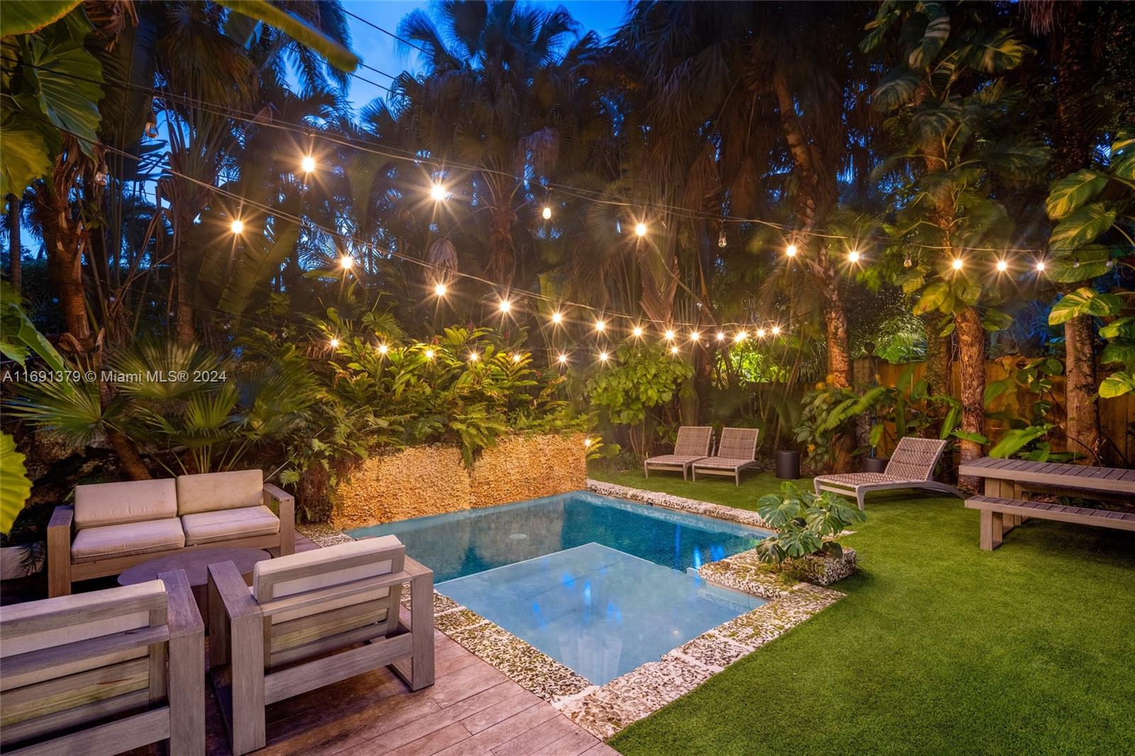 3685 St Gaudens Road Miami, FL 33133 - Photo 61 of 66 a view of a patio with swimming pool