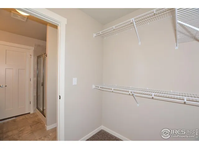 a view of small space with racks on the wall