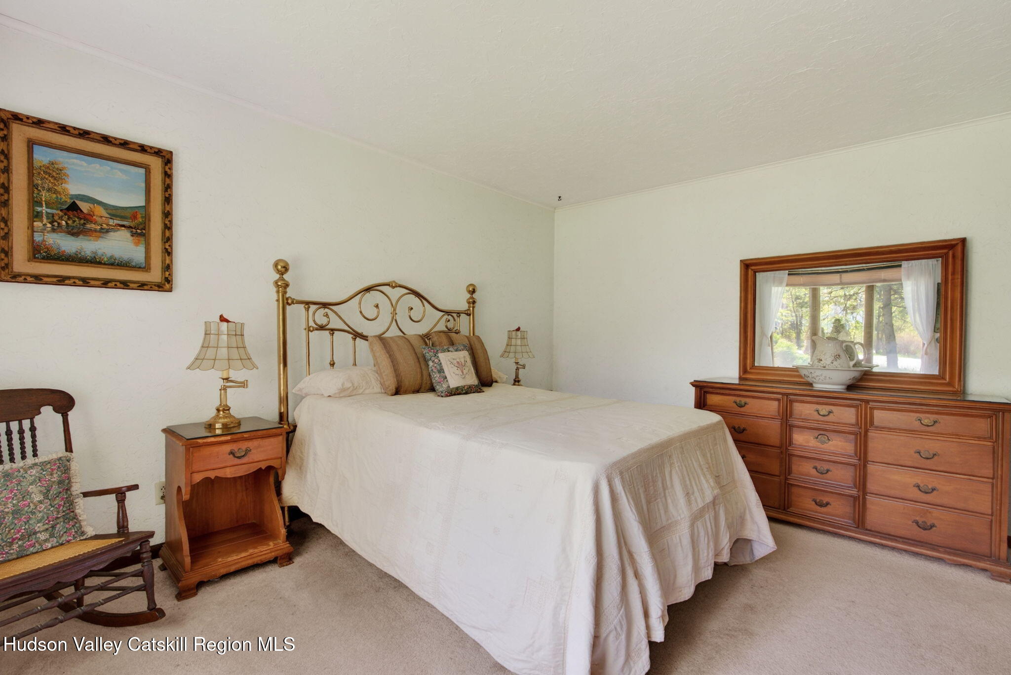 689 Old Road Windham, NY 12496 - Photo 16 of 42 a bedroom with a bed and a window