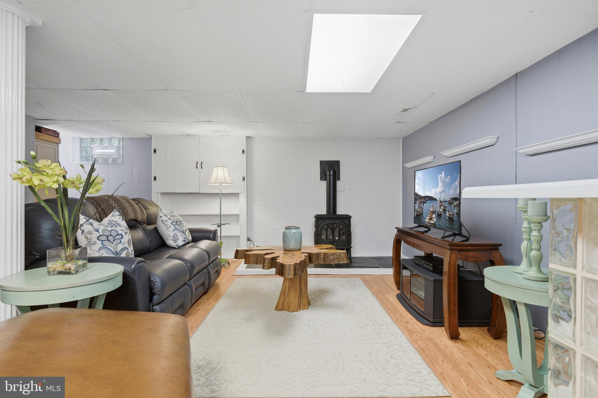 100 David Gray Road St. Leonard, MD 20685 - Photo 43 of 61 Warm up to the wood stove on a chilly night.