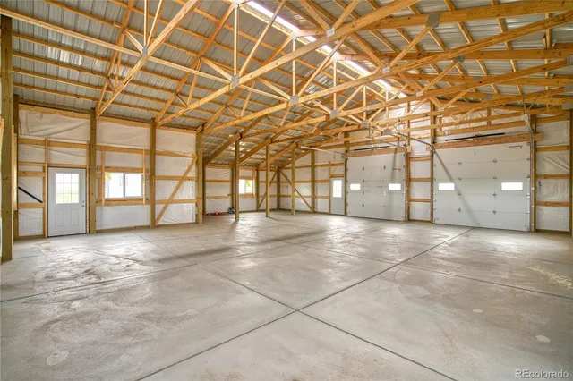 a view of empty room with windows