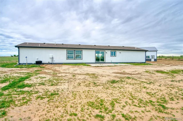 a front view of house with yard