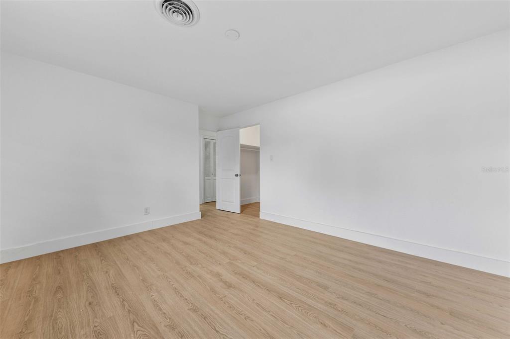 1822 Banyan Tree Drive Edgewater, FL 32132 - Photo 23 of 63 a view of an empty room and wooden floor