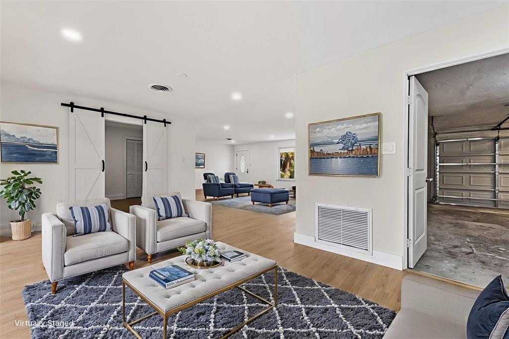 1822 Banyan Tree Drive Edgewater, FL 32132 - Photo 28 of 63 a living room with furniture and a rug