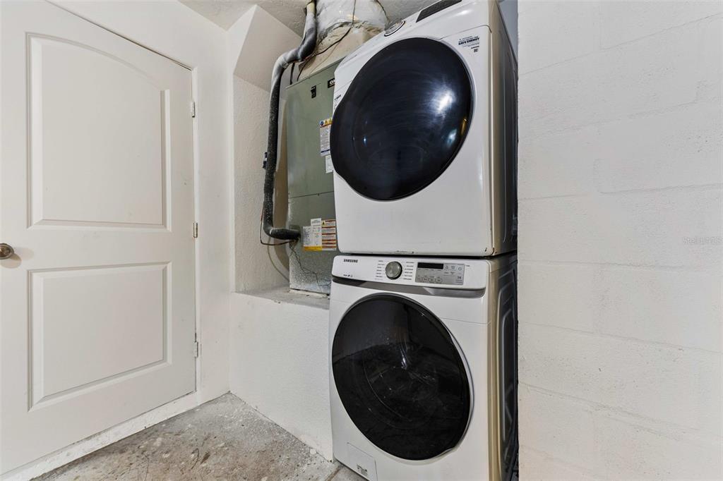 1822 Banyan Tree Drive Edgewater, FL 32132 - Photo 37 of 63 a close up view of a washer and dryer