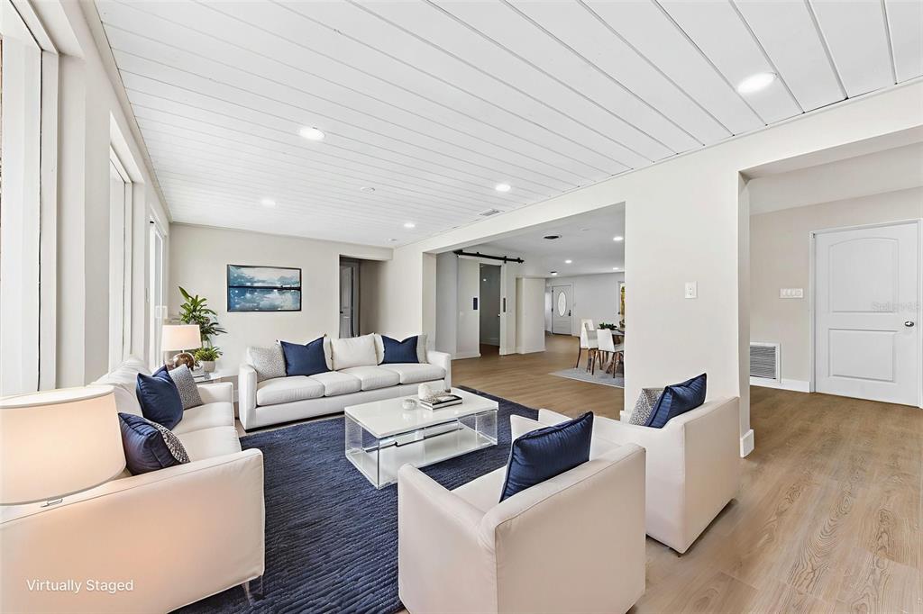 1822 Banyan Tree Drive Edgewater, FL 32132 - Photo 47 of 63 a living room with furniture and wooden floor