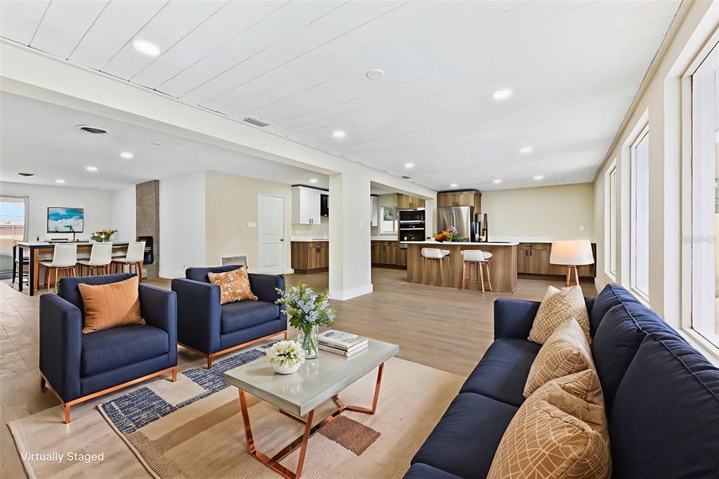 1822 Banyan Tree Drive Edgewater, FL 32132 - Photo 49 of 63 a living room with furniture kitchen view and a table