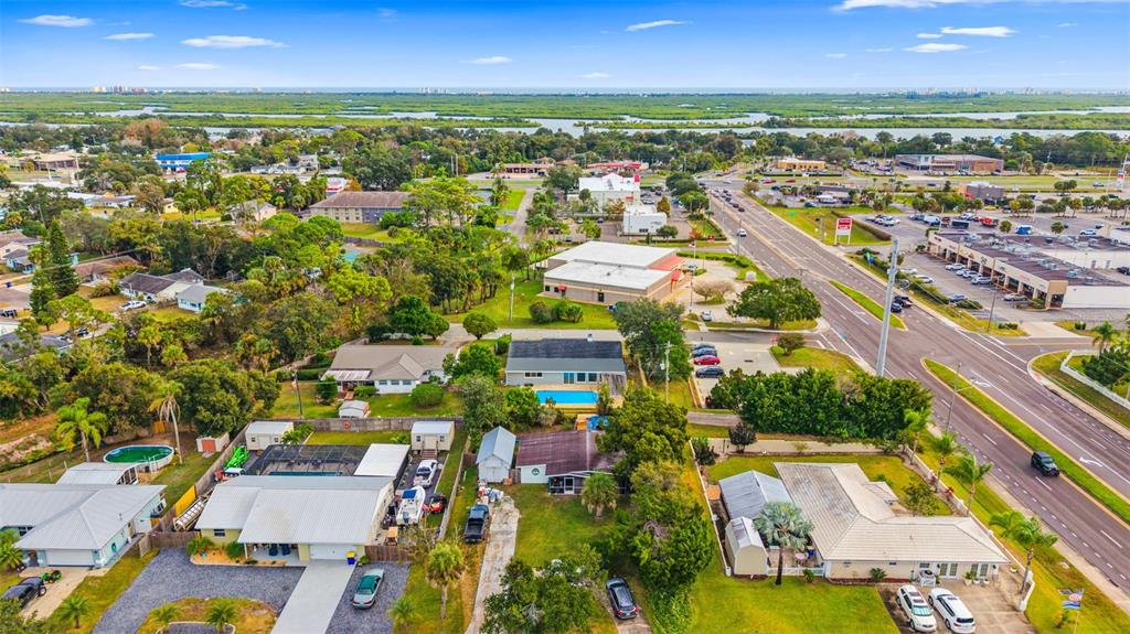 1822 Banyan Tree Drive Edgewater, FL 32132 - Photo 62 of 63 an aerial view of residential houses with outdoor space