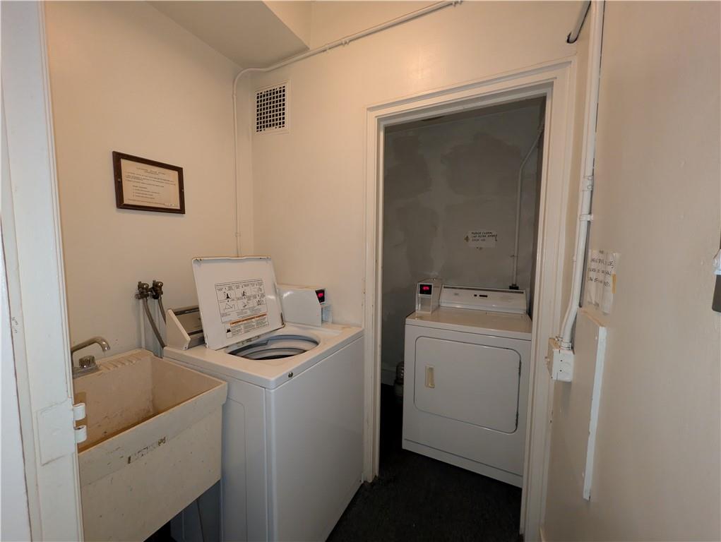 144 North Dithridge Street, Unit 403 Pittsburgh, PA 15213 - Photo 23 of 31 a room with storage and utility