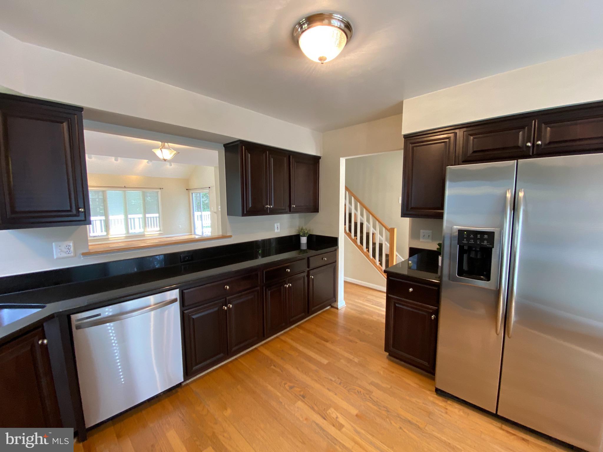 1256 Wedgewood Manor Way Reston, VA 20194 - Photo 8 of 45 Open pass through to the Dining Room...
