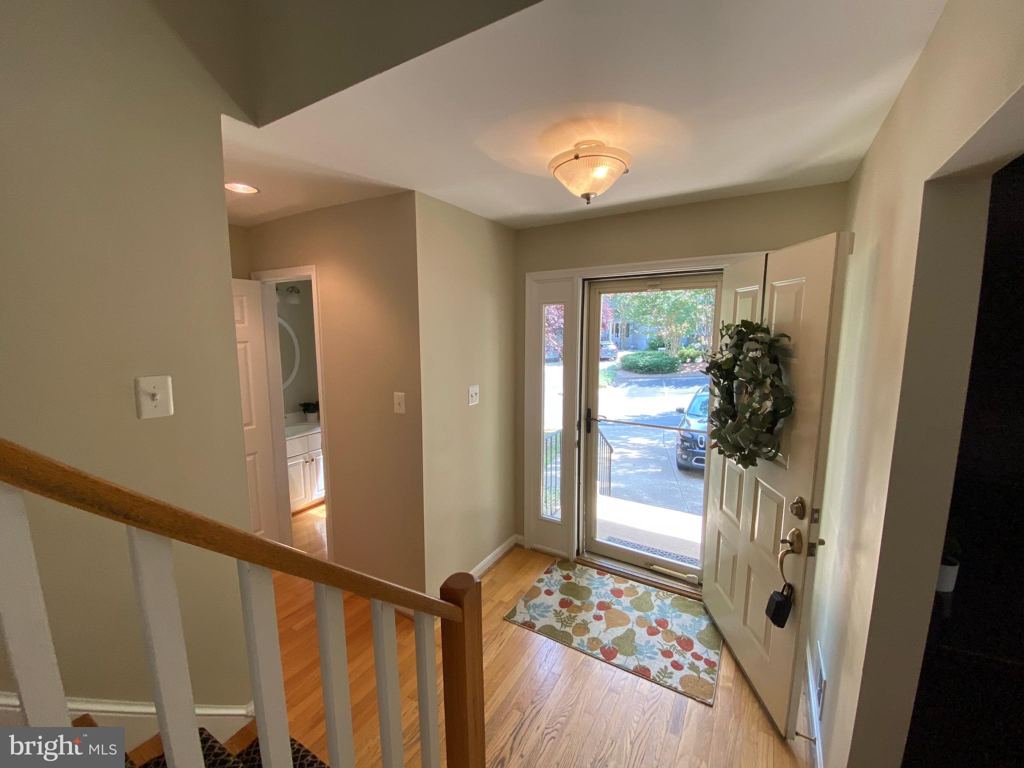 1256 Wedgewood Manor Way Reston, VA 20194 - Photo 10 of 45 The Foyer offers a Coat Closet & Half Bath...