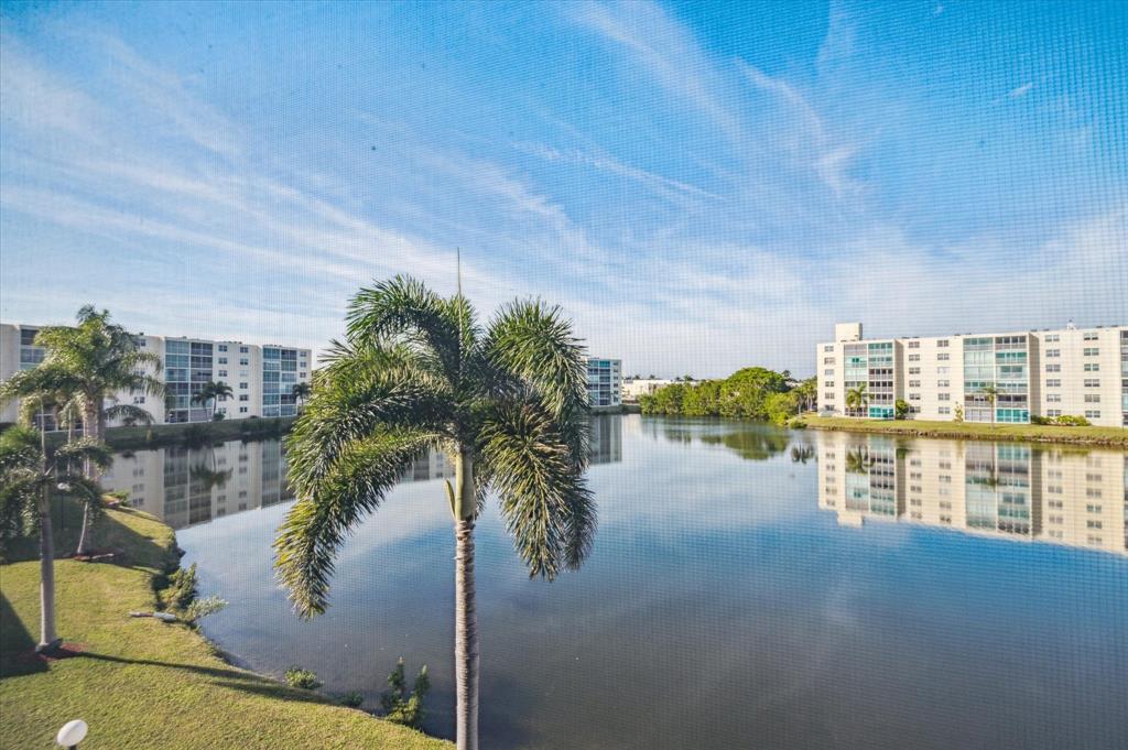 131 Southeast 3rd Avenue, Unit 302 Dania Beach, FL 33004 - Photo 1 of 16 a view of lake from balcony